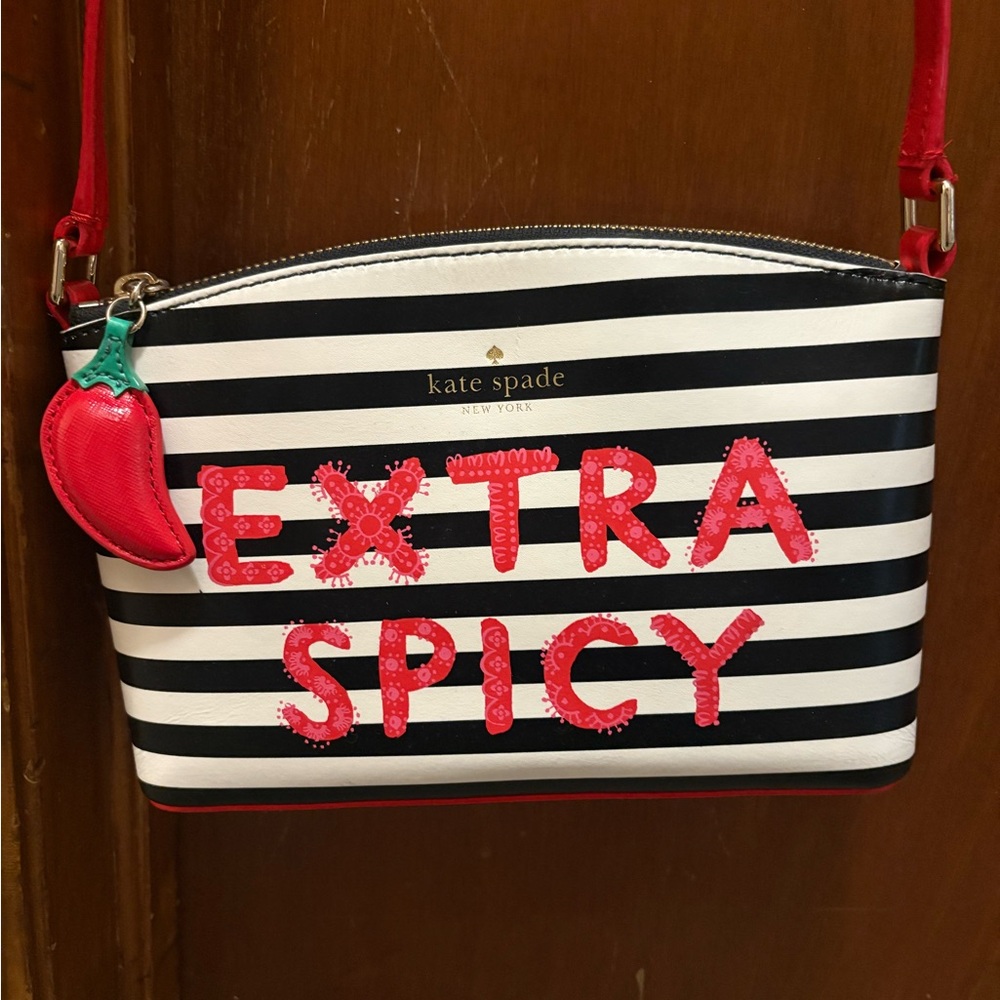 kate spade black & white striped crossbody with red "EXTRA SPICY" applique